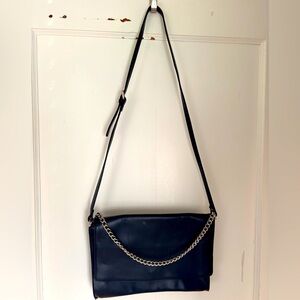 Zara leather navy purse with silver chain detail.